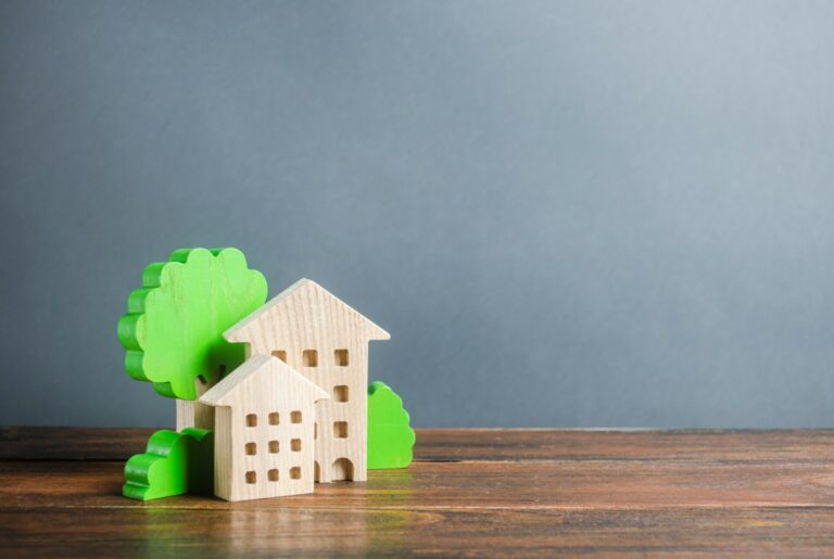 Figures Of Houses And Trees. Affordable Comfortable Housing. Purchase Of Apartments And Real Estate, Rent And Sale. Housing, New Home. Modern Architecture. Mortgage